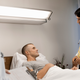 Image for article titled Doctors Assure Recovering Patient He Has Many More Years Of Looking At Phone Ahead Of Him